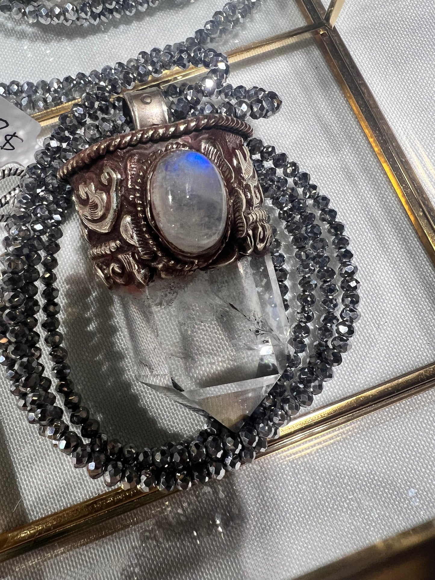 Tibetan Want quartz, and Moonstone pendant, sterling silver made by Tibetan monks with a hematite chain