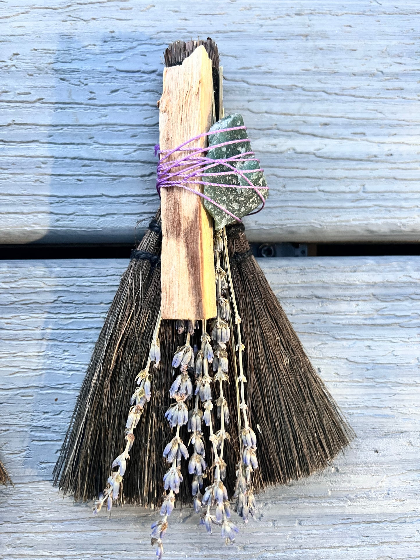 Besom broom with protection crystal and palo santo and lavender